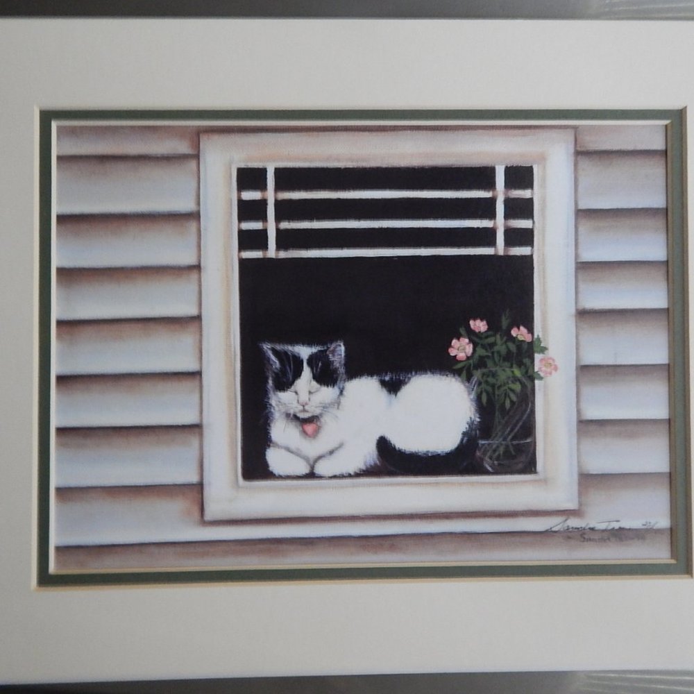 An 11 x 14 matted print of a painting called  "Lovey"